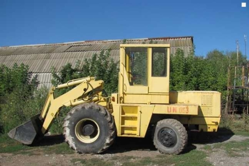 Конструктивные особенности и назначение погрузчика УН-053