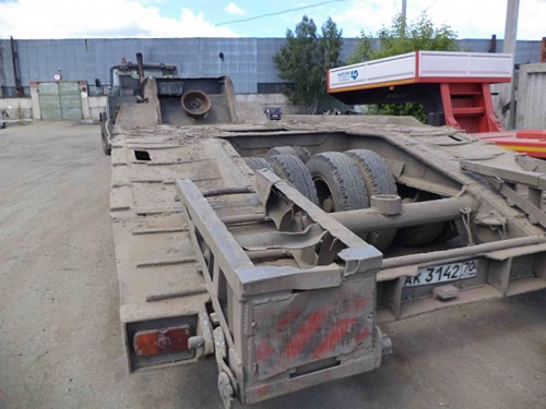 прицеп ЗПТ-40-206: погрузка гусеничного крана мкг-25