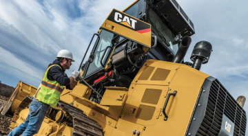 Компания Caterpillar представила новый. улучшенный экскаватор-погрузчик